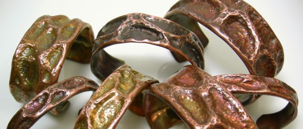 Air chased copper cuffs